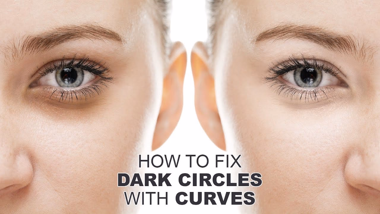 How do I get rid of dark circles on my face in Photoshop?